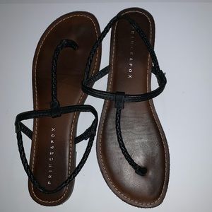 Black braided sandals with brown sole